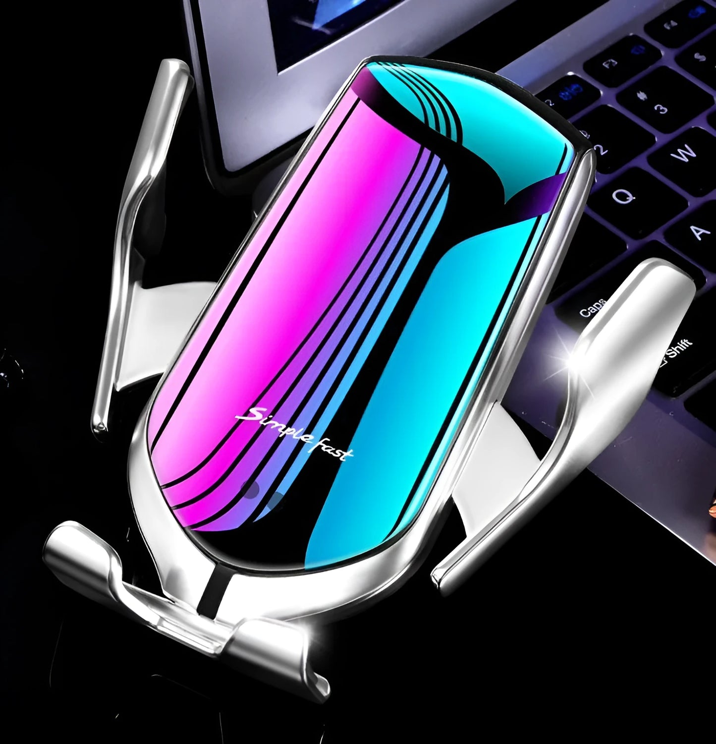 Magic Clip R1 car phone holder in gold or silver with automatic clamping and wireless charging feature