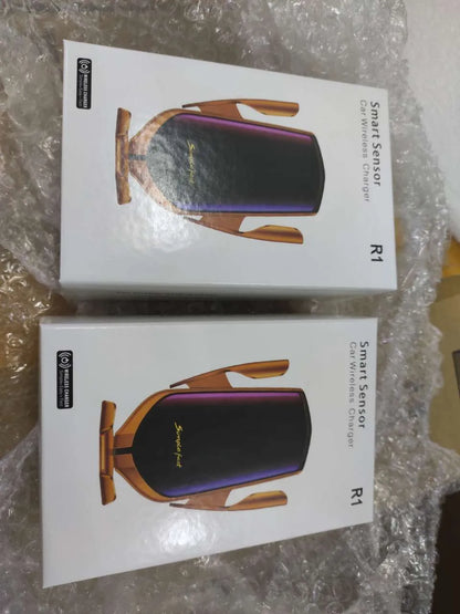 Magic Clip R1 car phone holder in gold or silver with automatic clamping and wireless charging feature