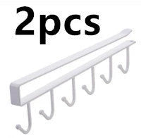 Sturdy wrought iron wall hook with seamless, nail-free design for versatile storage and organization in the home or office