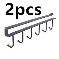 Sturdy wrought iron wall hook with seamless, nail-free design for versatile storage and organization in the home or office