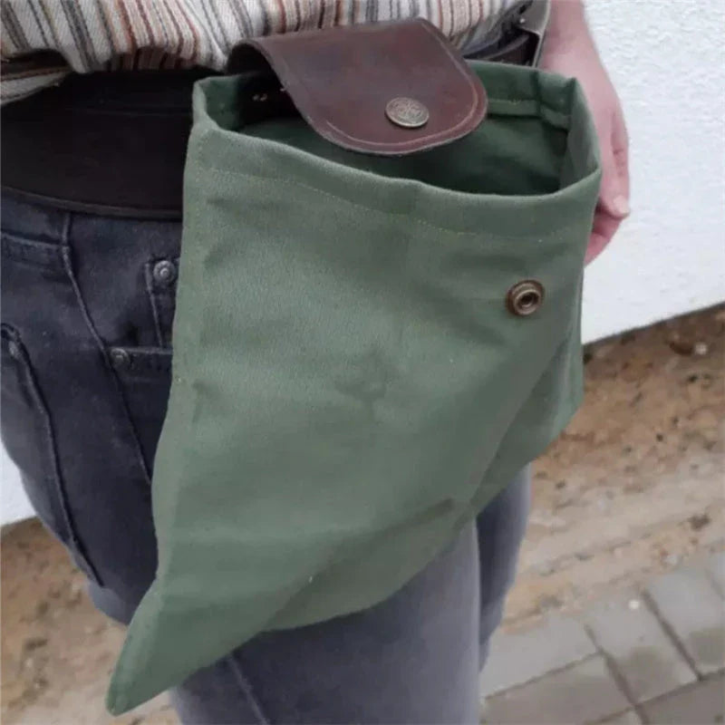 Rugged and versatile waxed canvas hiking waist bag with belt loop for outdoor adventures and berry foraging
