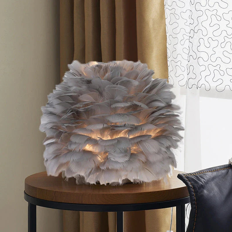 Elegant swan feather table lamp with warm, ambient lighting for bedrooms and living rooms