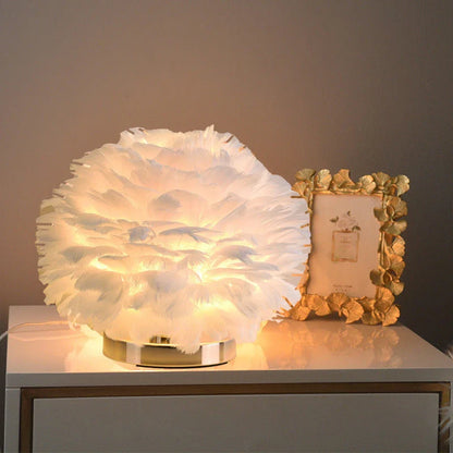 Elegant swan feather table lamp with warm, ambient lighting for bedrooms and living rooms