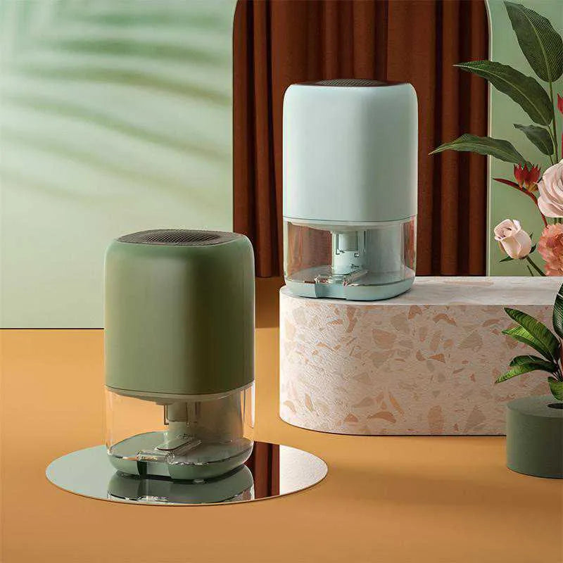 Mini portable dehumidifier in white, blue, or dark green with 0.7L water tank