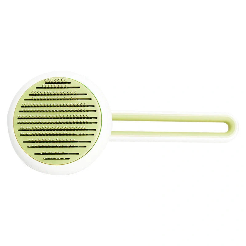 Automatic pet hair remover brush in pink, blue, and green with stainless steel pins