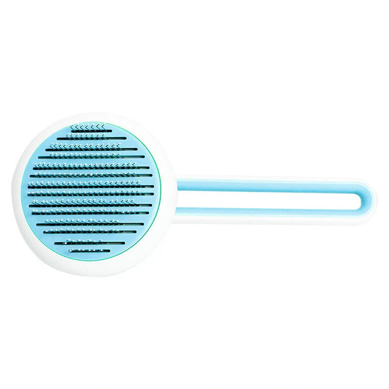 Automatic pet hair remover brush in pink, blue, and green with stainless steel pins