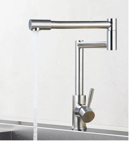 Brushed silver stainless steel kitchen mixer tap with a spout rotated to the side