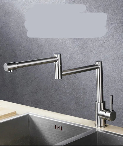 Silver stainless steel kitchen mixer tap with two lever handles and a spout rotated to the side.