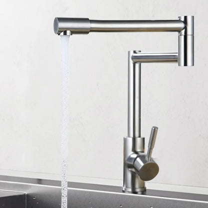 Silver stainless steel kitchen mixer tap with two lever handles and a spout rotated to the side.