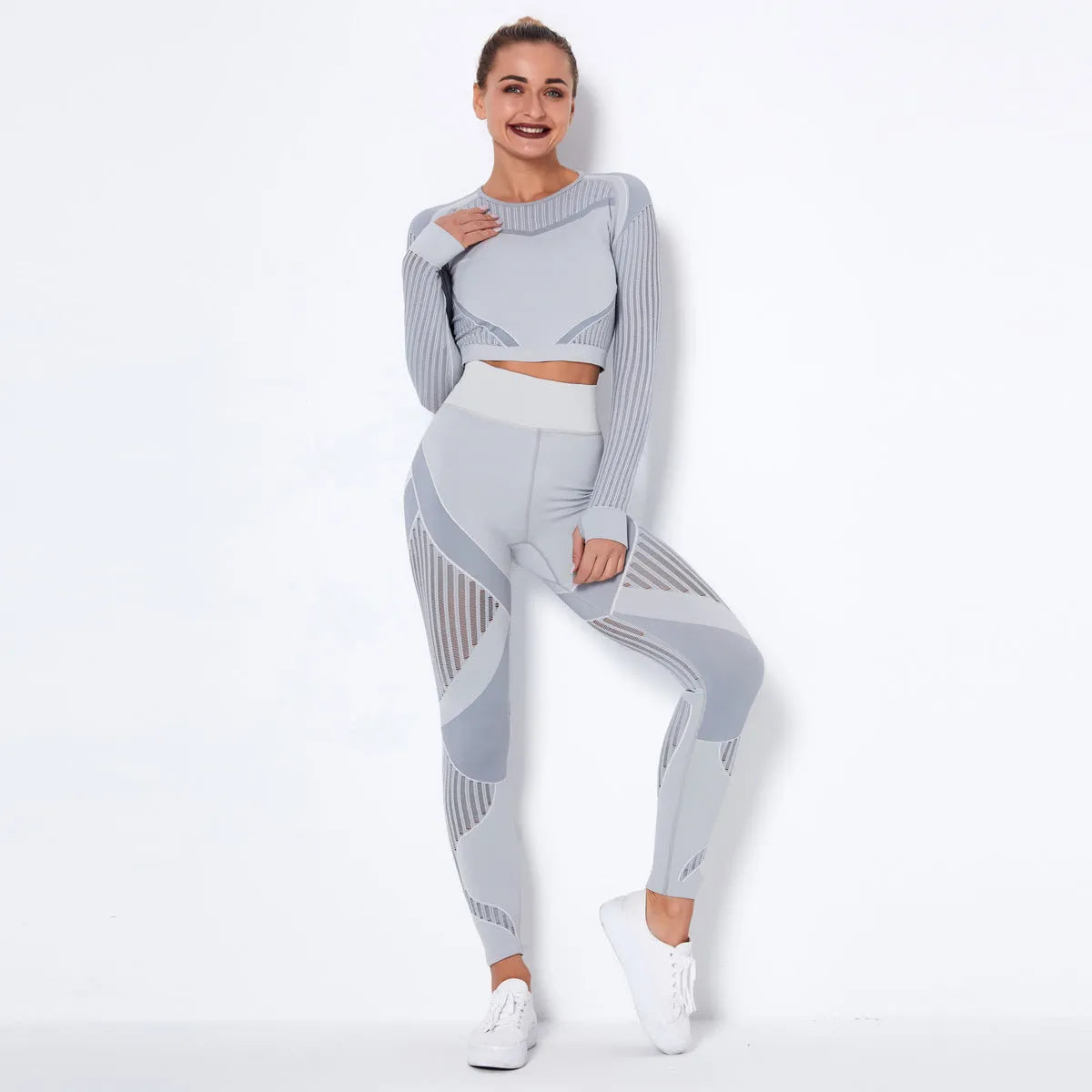 Seamless knitted yoga wearsuit for women in long-sleeved design with stripe pattern
