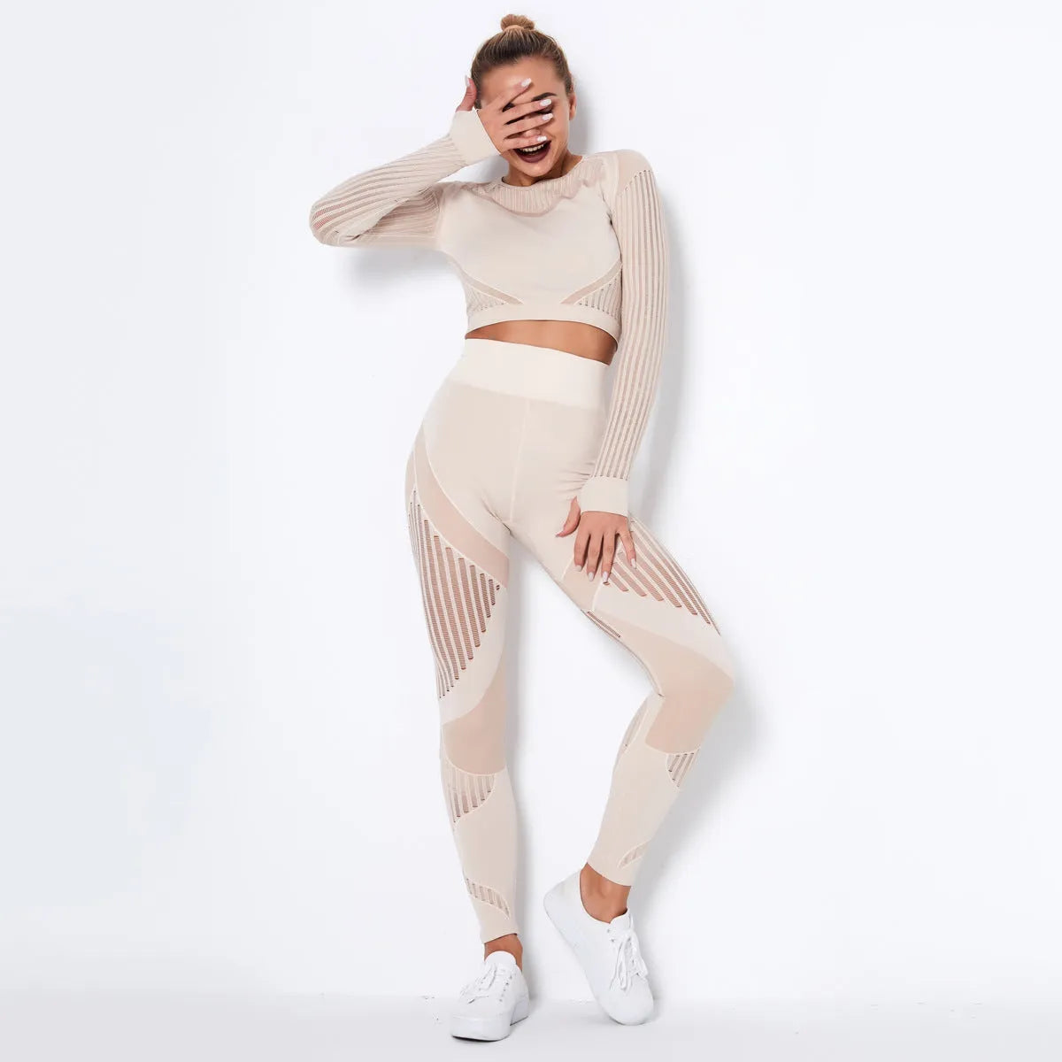 Seamless knitted yoga wearsuit for women in long-sleeved design with stripe pattern