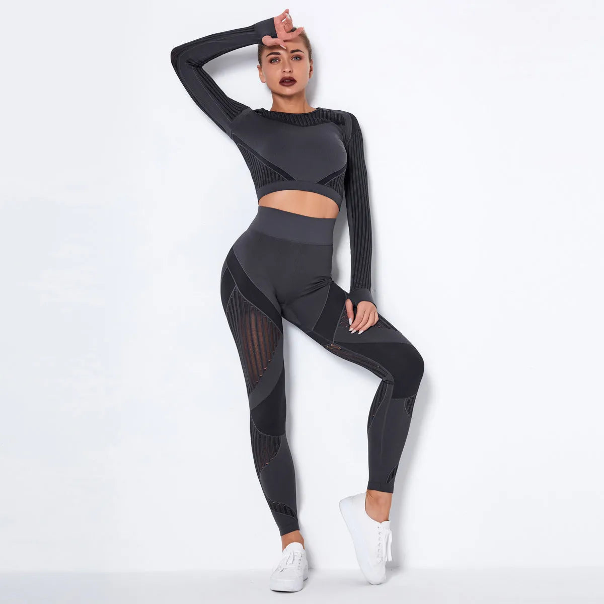 Seamless knitted yoga wearsuit for women in long-sleeved design with stripe pattern