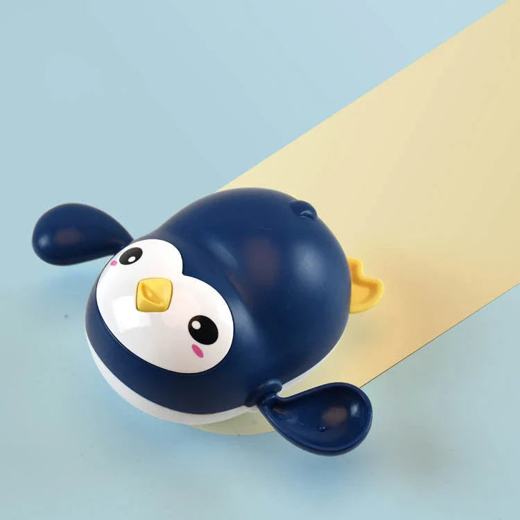 Colourful wind-up penguin bath toys that float, swim, and waddle across the tub, providing endless entertainment for children during bath time