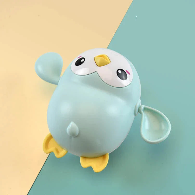 Colourful wind-up penguin bath toys that float, swim, and waddle across the tub, providing endless entertainment for children during bath time