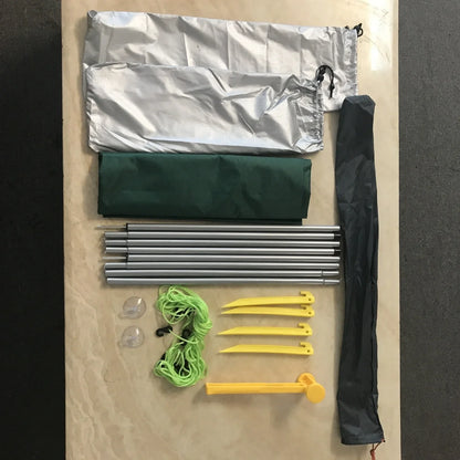 Green double tent awning with aluminium poles measuring 2.8m long by 1.8m wide