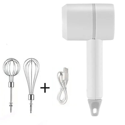 Green rechargeable electric hand mixer with whisk and beater attachments on a kitchen counter