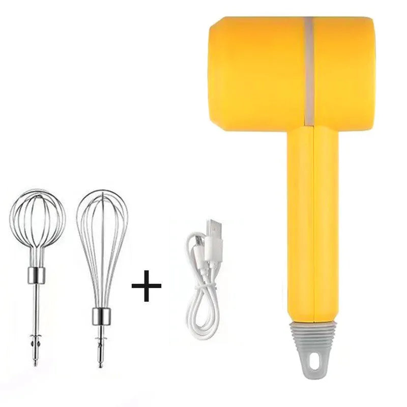 Green rechargeable electric hand mixer with whisk and beater attachments on a kitchen counter