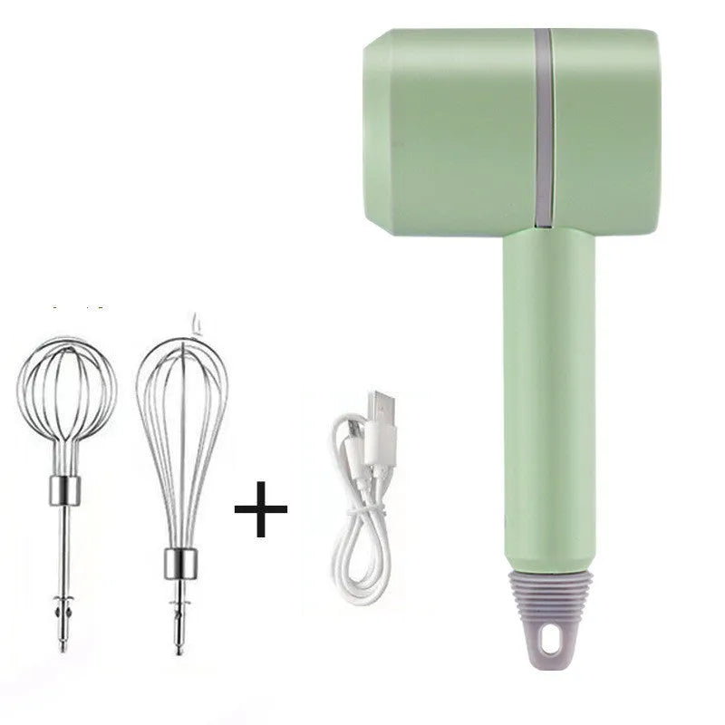 Green rechargeable electric hand mixer with whisk and beater attachments on a kitchen counter