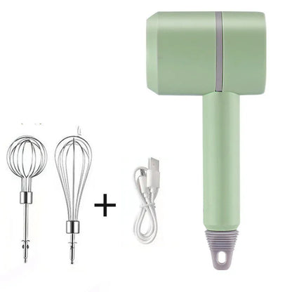 Green rechargeable electric hand mixer with whisk and beater attachments on a kitchen counter