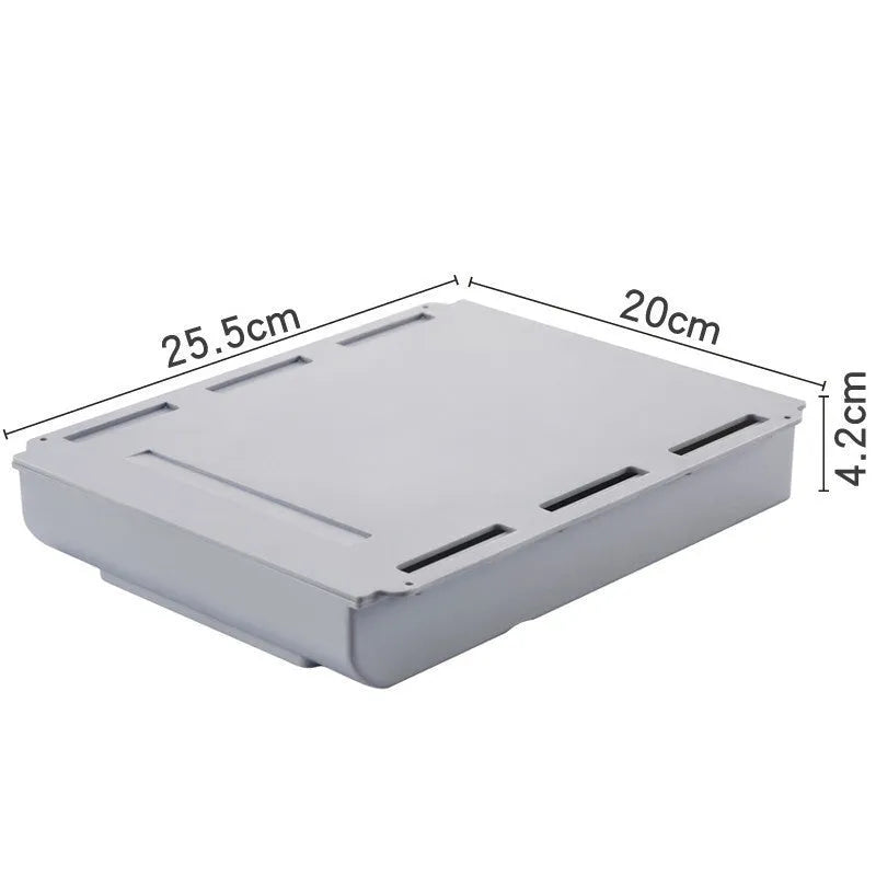Japanese style plastic drawer storage box in grey and white colours placed under a table