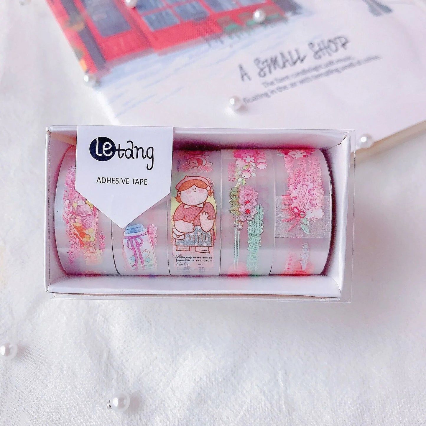 Five rolls of decorative washi tape with dinosaur, duck, rabbit and cat cartoon designs