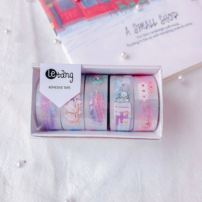 Five rolls of decorative washi tape with dinosaur, duck, rabbit and cat cartoon designs