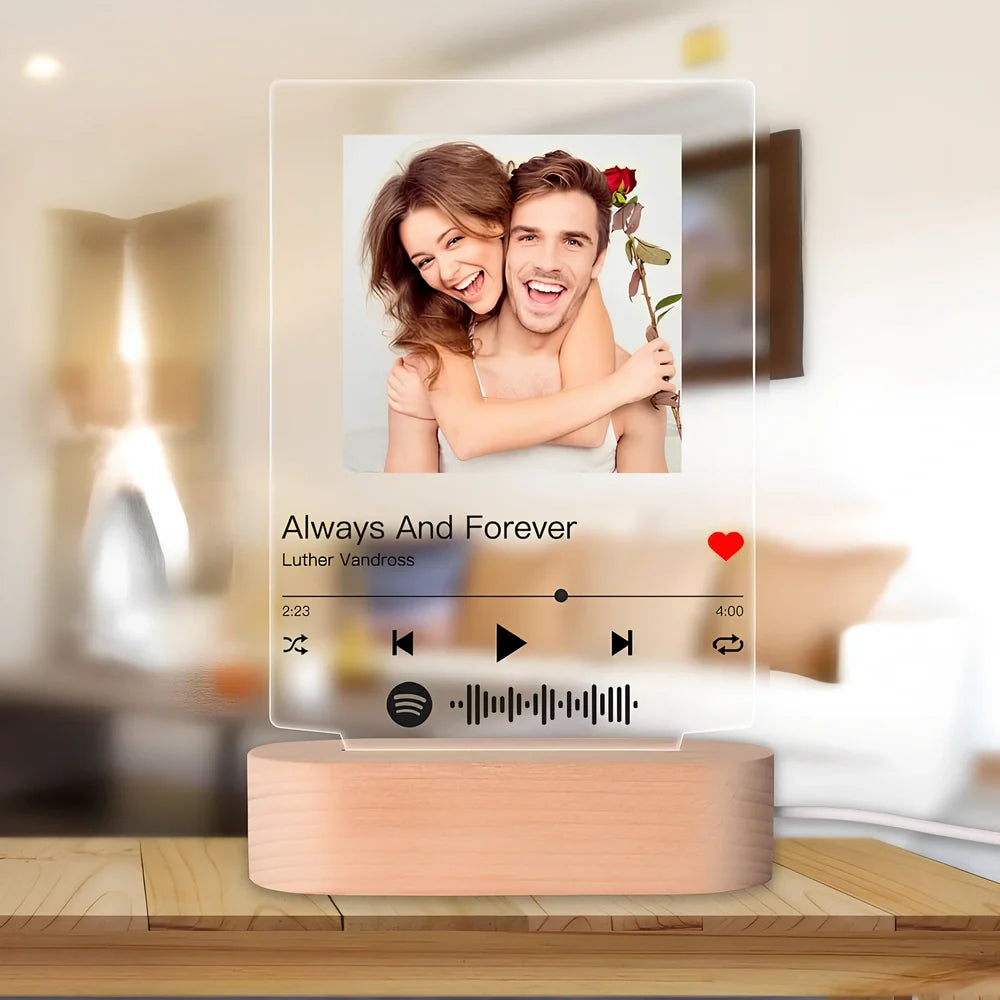 Custom acrylic night light with engraved photo and song lyrics, 22cm wide with LED base