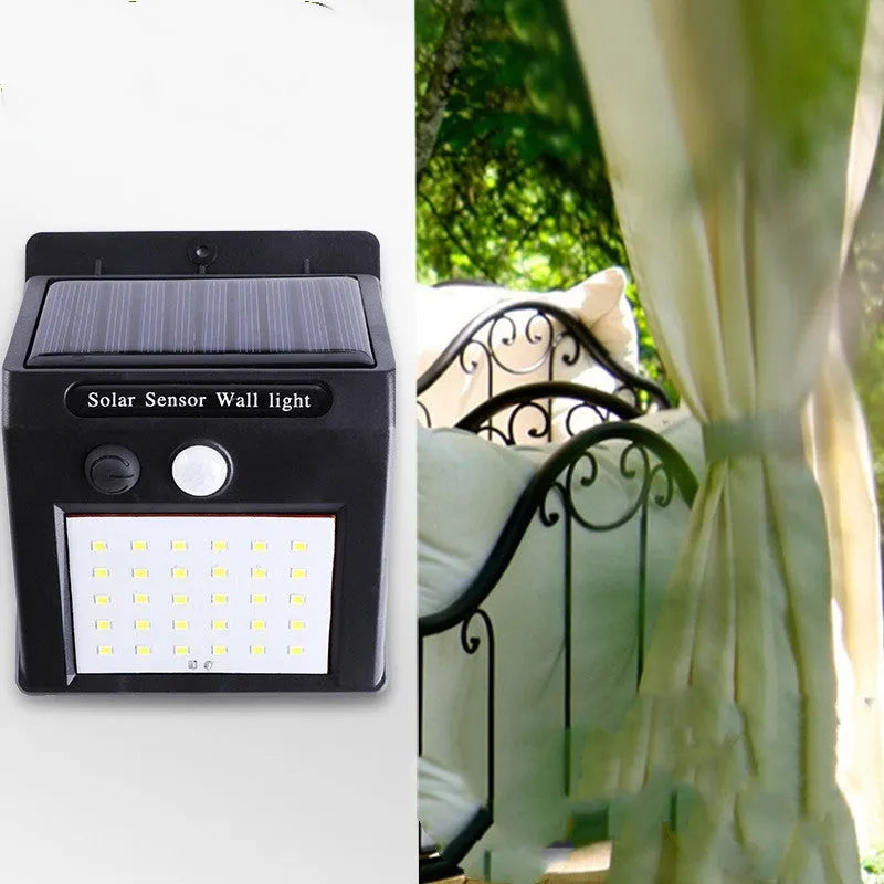 Solar-powered outdoor garden lamp with motion sensor mounted on wooden post