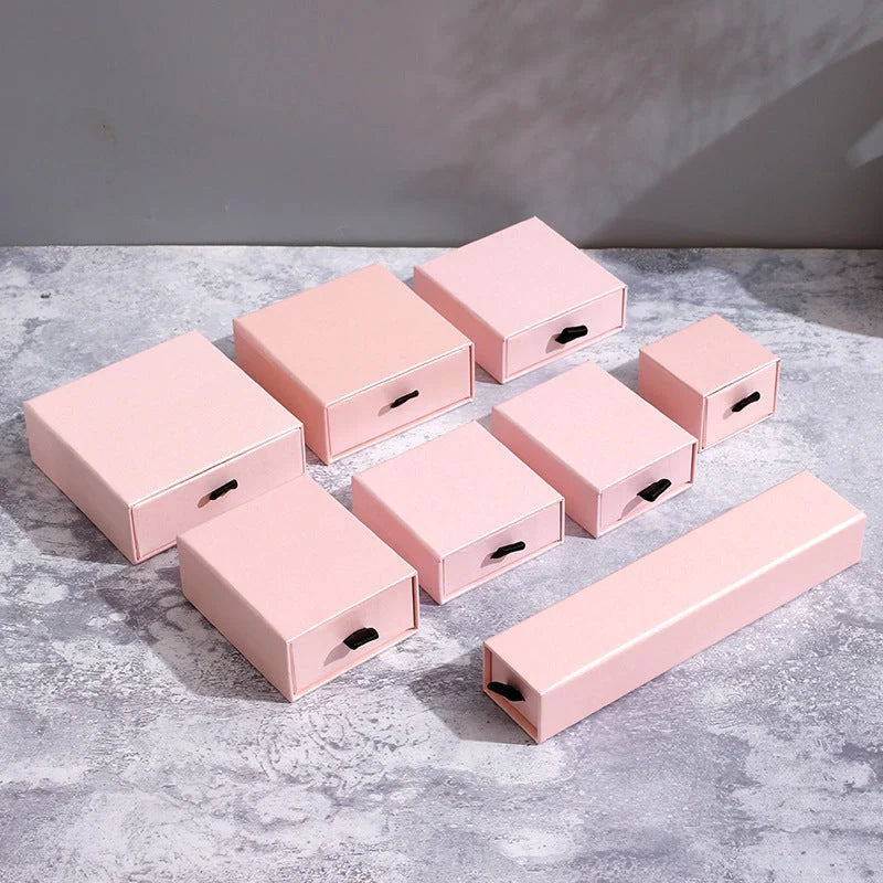 Drawer-style jewellery storage box with pull-out trays for organised accessory storage