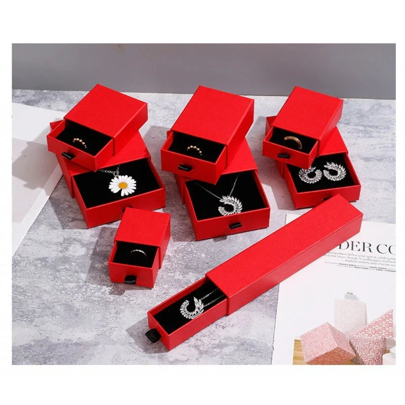 Drawer-style jewellery storage box with pull-out trays for organised accessory storage