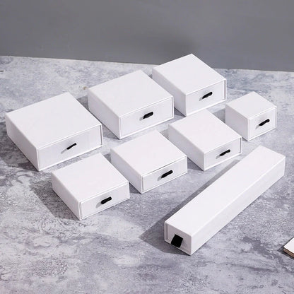 Drawer-style jewellery storage box with pull-out trays for organised accessory storage