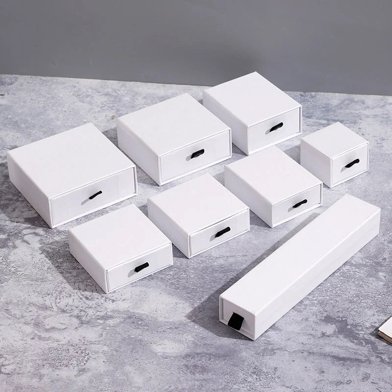 Drawer-style jewellery storage box with pull-out trays for organised accessory storage