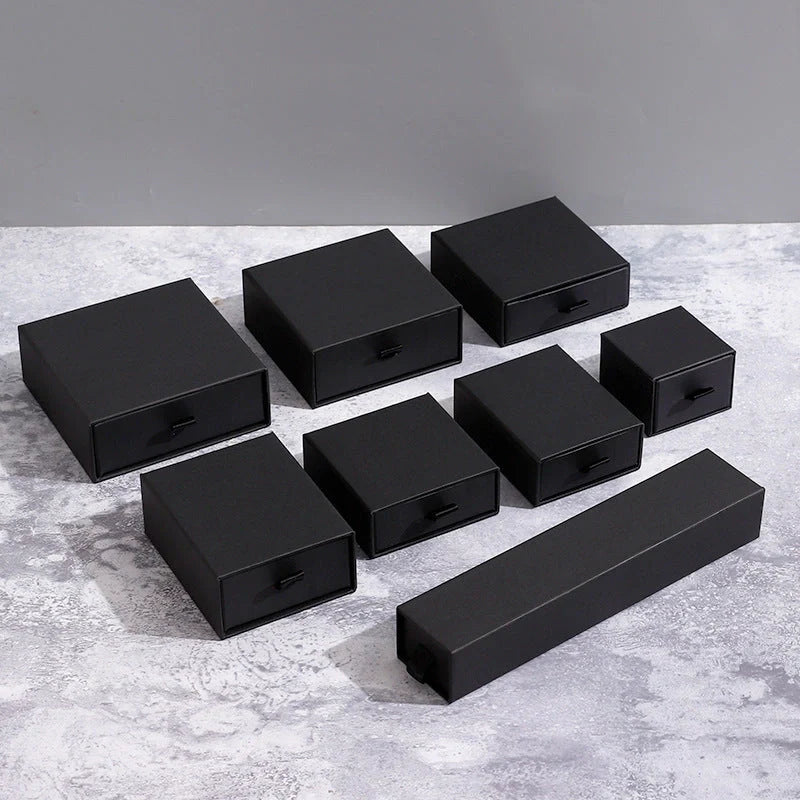 Drawer-style jewellery storage box with pull-out trays for organised accessory storage