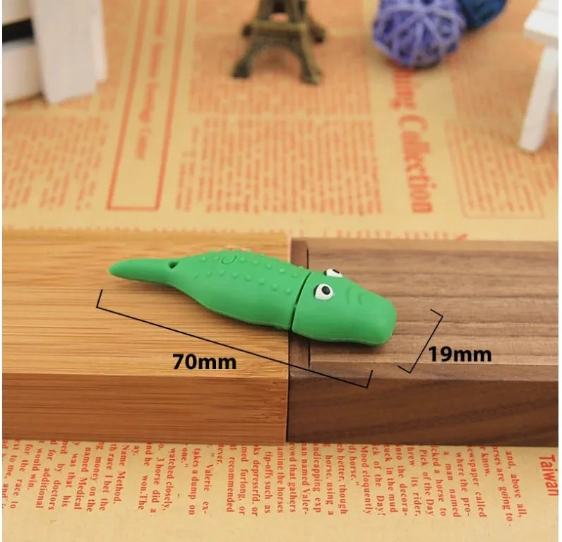 Green creative anime USB flash drive with PVC shell and USB 2.0 interface.