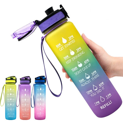 Blue and red gradient 1 litre Tritan sports water bottle with time markers and a flip-top lid.