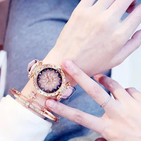 Women's diamond decorative watch with round dial showing red colour option and pin buckle clasp