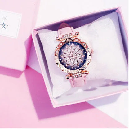 Women's diamond decorative watch with round dial showing red colour option and pin buckle clasp