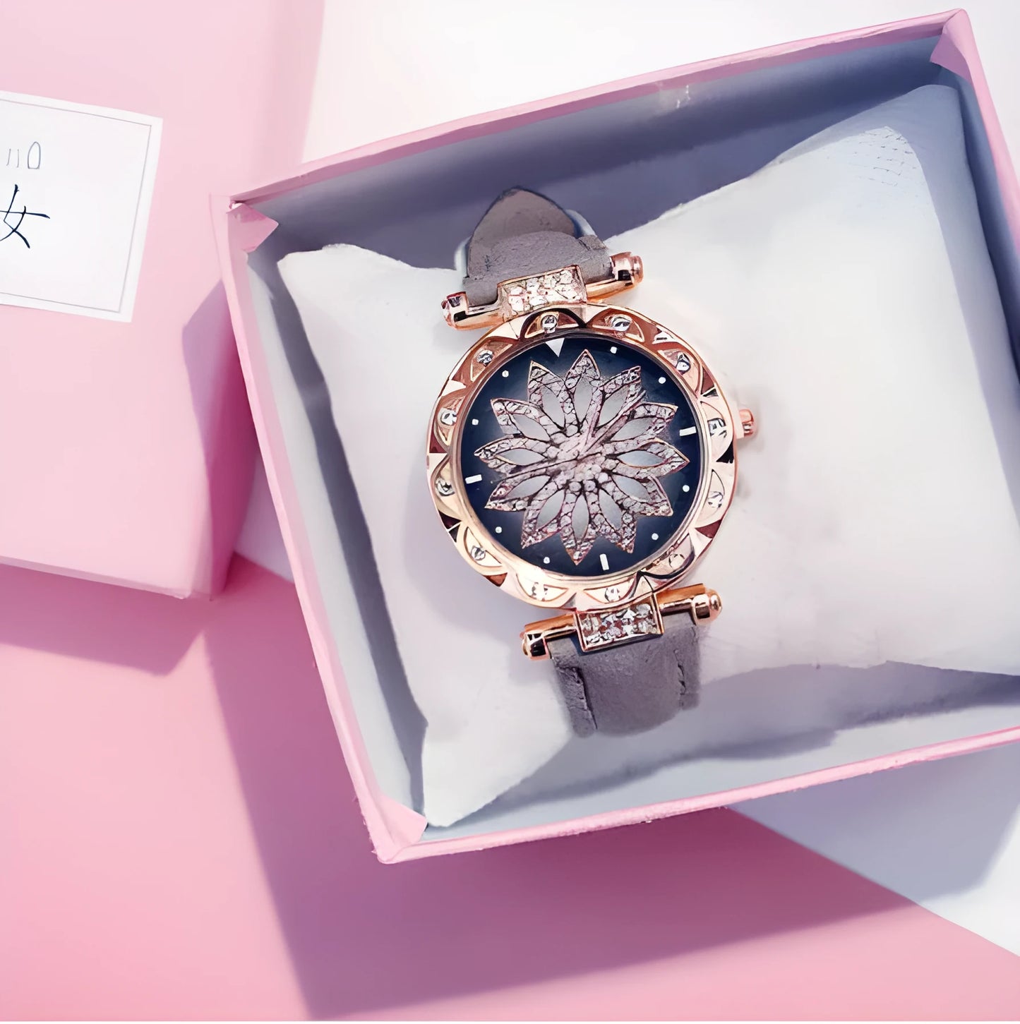 Women's diamond decorative watch with round dial showing red colour option and pin buckle clasp