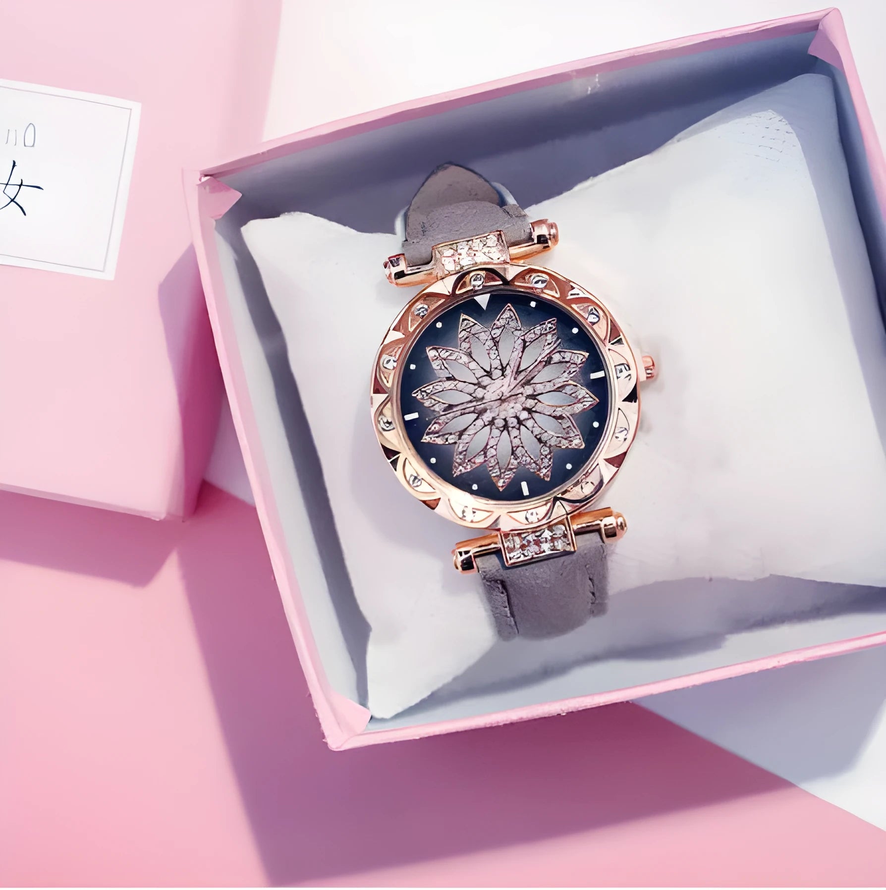 Women's diamond decorative watch with round dial showing red colour option and pin buckle clasp