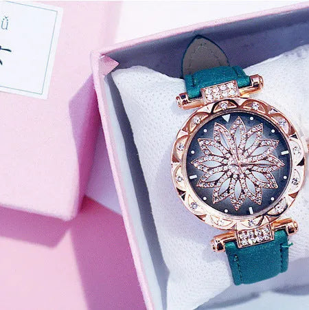 Women's diamond decorative watch with round dial showing red colour option and pin buckle clasp