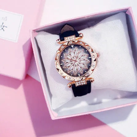 Women's diamond decorative watch with round dial showing red colour option and pin buckle clasp