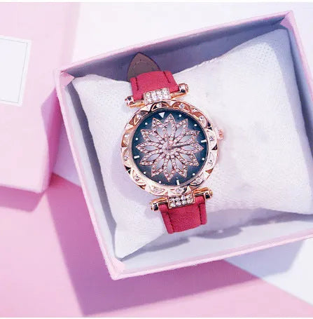 Women's diamond decorative watch with round dial showing red colour option and pin buckle clasp