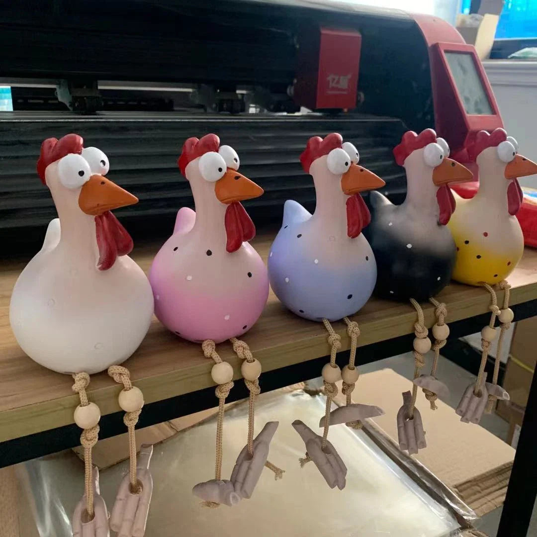 Charming hen and rooster ornaments made of durable resin with vibrant colours and intricate details for elegant garden decor