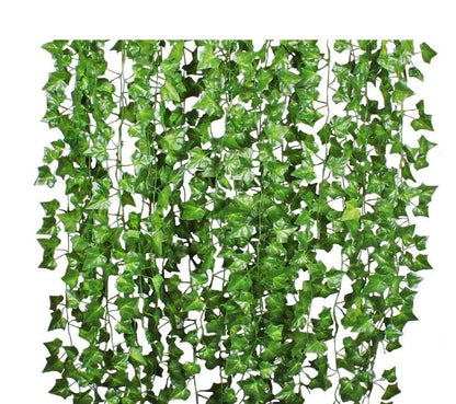 Premium silk hanging leaf garland with realistic green leaves and flexible rattan vine for customizable home, wedding, and garden decor