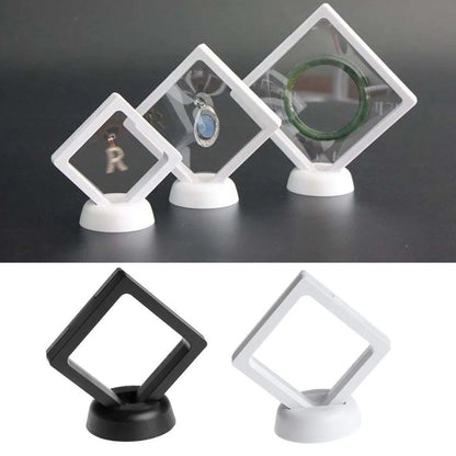 3D floating jewelry coin display stand in white and black, showcasing collectibles in mid-air