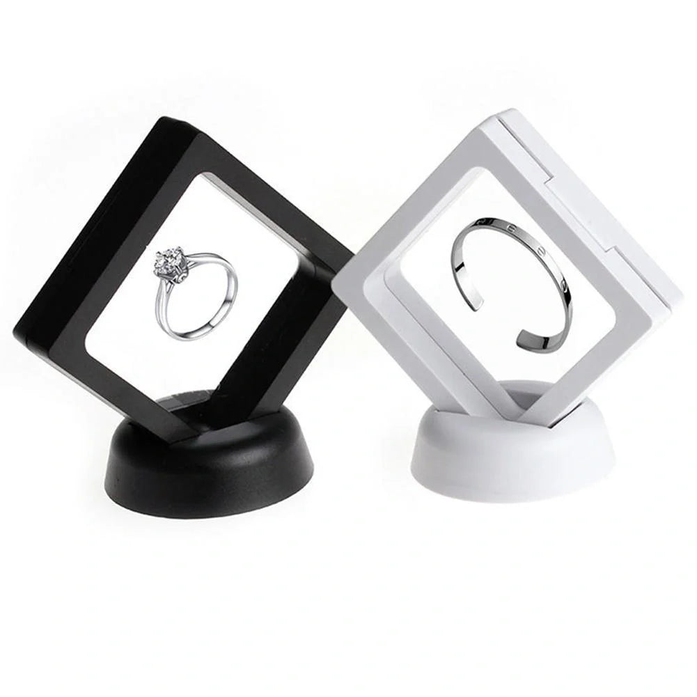 3D floating jewelry coin display stand in white and black, showcasing collectibles in mid-air