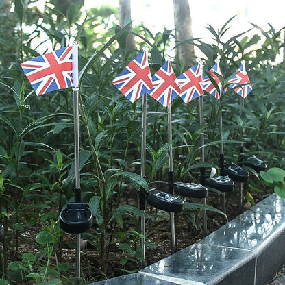 Solar garden flag light with American flag design on stainless steel pole, 34cm tall