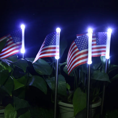 Solar garden flag light with American flag design on stainless steel pole, 34cm tall