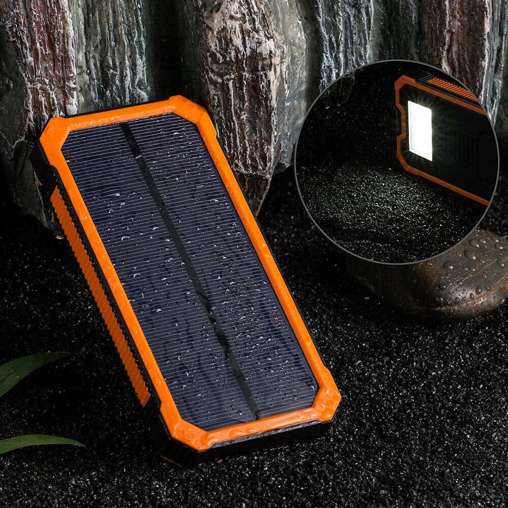Rugged orange solar power bank showing USB ports and solar panel, labelled 20000mAh.