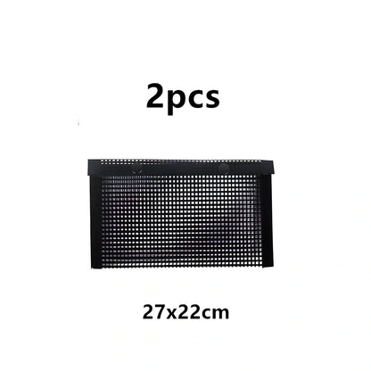 Black grill mesh bag with non-stick grid mat for BBQ cooking showing smoke-through design